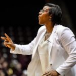 From being a McDonald’s All American, to playing for Pat Summit, and going pro, Coach Randall-Lay has taken a unique path to coaching Winthrop WBB. (Credit: Big South Conference)
