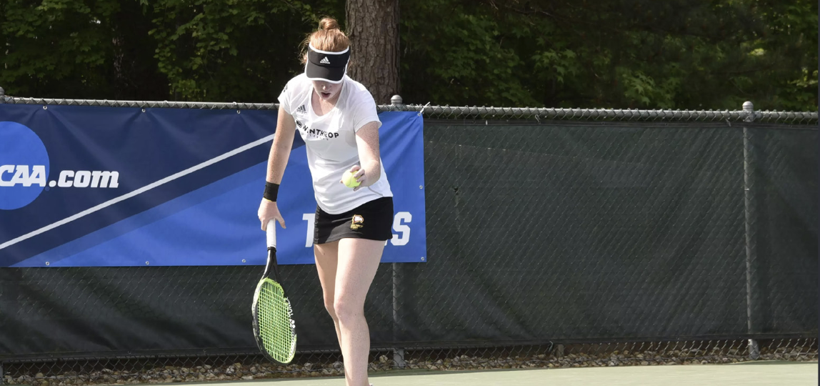 Photo via winthrop.edu Winthrop Tennis player prepares to serve